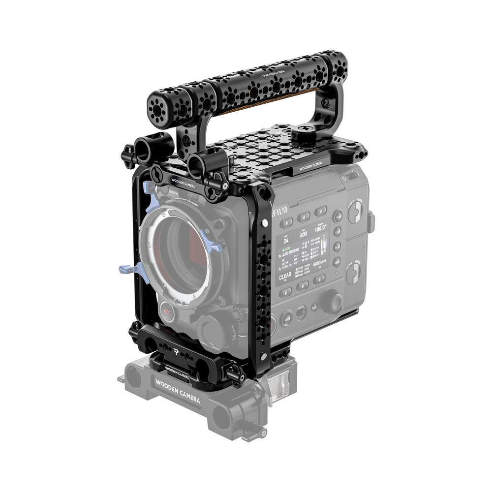 fujifilm eterna 55 camera body with wooden camera handle and accessories on a white background