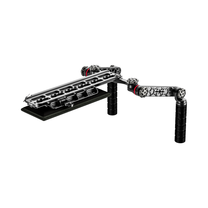 Camera shoulder rig with a safety dovetail and shoulder pad 